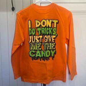 Halloween. Kids large 10/12. I don’t do tricks just give me the candy tshirt.